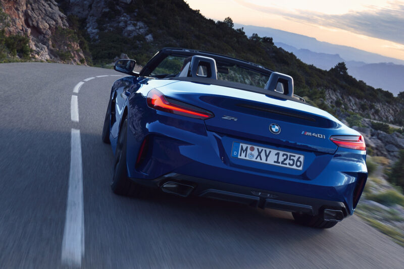 A BMW Z4 driving off into the distance.