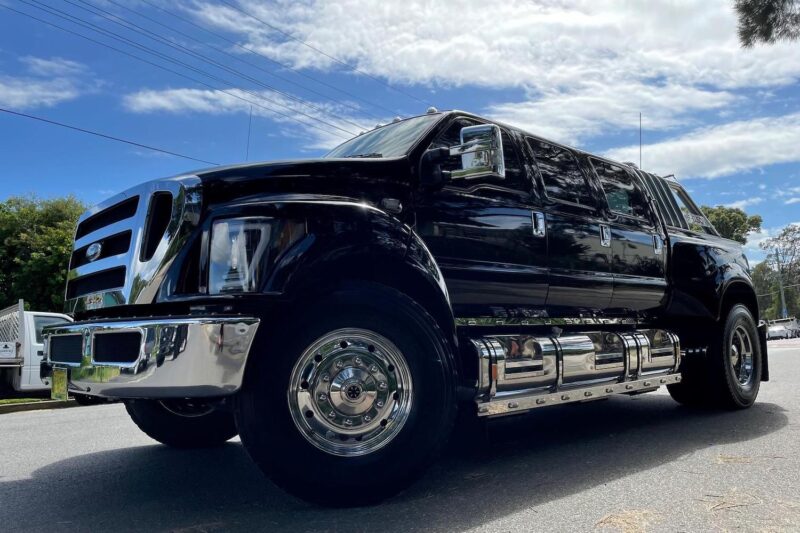 A black Ford F-650 truck.